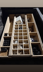 Organized drawers of sprinkler parts and fittings in the work trailer